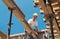 Construction worker placing formwork beams