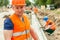 Construction worker in safety waistcoat