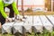 Construction worker unloading concrete stake from truck