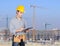 Construction worker writing paperwork