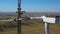 Construction workers are assembling a wind turbine, high altitude work, 4k