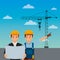 Construction workers engineer foreman blueprint crane on sky background