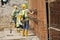 Construction workers fabricate retaining wall reinforcement bar and formwork at the construction site.