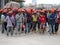 Construction workers gathered in the open space at the construction site to hear briefing.