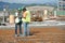 Construction workers having a discussion at the construction site.