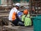 Construction workers having a discussion at the construction site.