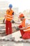 Construction workers paving street