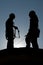 Construction workers performing, backlight on a roof, safety