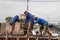 Construction workers pouring cement to creating beam to build a