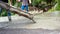 Construction workers pouring wet concrete for cement floors.