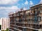 Construction workers on scaffolding - building of flats