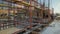 Construction workers working on steel rods used to reinforce concrete timelapse