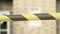 Construction yellow-black tape front of building, warning sign, danger risk