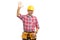 Constructor holding palm up as greeting concept