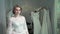 The consultant helped the future bride to choose wedding dress
