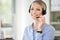 Consultant, portrait of woman call center agent and with headset at her workplace office. Telemarketing or customer