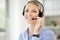 Consultant, portrait of woman call center agent and with headset at her workplace office. Telemarketing or customer