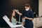 Consultation with a dermatologist. A trichologist examines the hair of a woman