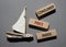 Consumer Price Index symbol. Concept words Consumer Price Index on wooden blocks. Beautiful grey background with boat. Business