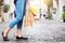 Consumerism woman holding many shopping bags in fashion boutique