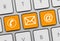 Contact - Inscription on Orange Keyboard Key