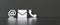 Contact Methods. Close-up Of A Phone, Email and Post Icons Leaning On black Wall