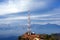 Contact mobile tower at high hilly village of Ashapuri in Himachal Pradesh, India with snow mountains in the backdrop