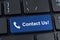 Contact Us button keyboard with icon handset.