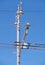 Contact wires of a trolley bus against a sky