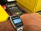 Contactless paying system with smartphone and wireless receiver, detail on man wrist