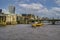 Container barge on the river thames