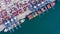 Container cargo ship  loading in a port, Aerial top view container cargo ship
