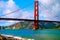 Container Cargo Ship under Golden Gate Bridge