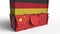 Container with flag of Germany breaks cargo container with flag of China. Trade war or economic conflict related