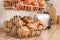 Container with potatoes and onions on kitchen counter. Orderly storage