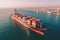 A Container ship aerial drone view, sea freight business logistics, export and import, shipping cargo boat transpor