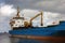 A container ship alongside the customs wharf in kingstown, st. vincent