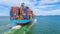 Container ship leaving the industrial port, Import and export business logistic and transportation of international by container