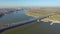 Container ship passing the bridge between Krefeld and Duisburg aerial time lapse