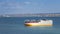 Container ship sailing along the river tagus, portugal