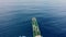 Container ship, sea and drone with aerial view outdoor with ocean and transportation. Journey, boat and commercial