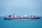 Container ship `Seaspan Bellwether` sailing through calm blue ocean.