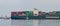 Container ship & tugs