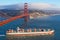 Container ship under Golden Gate bridge