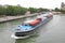 Container tanker Seine river cityscape Paris France