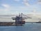 The Container Terminal at Freeport in the Bahamas, with a Container ship berthed alongside.