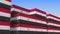 Container terminal full of containers with flag of Egypt. Egyptian export or import related loopable 3D animation