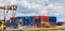 Containers at harbor of Rotterdam, Netherlands. Logistics business, cargo loading unloading