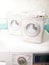 Containers for storing washing powder for different fabrics on a washing machine