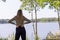 Contemplative Woman Overlooking a Serene Lake